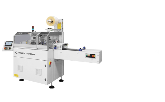 Automatic flow pack machines